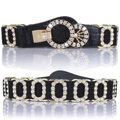 Add an elegant touch to your Dance America attire with our B007 elastic belt. Featuring gold and crystal oval accents, this adjustable belt is the perfect accessory to complete your look. Its stretchy design ensures a comfortable and secure fit, making it a practical yet stylish addition to your wardrobe. Elevate your ensemble with this sophisticated accessory.