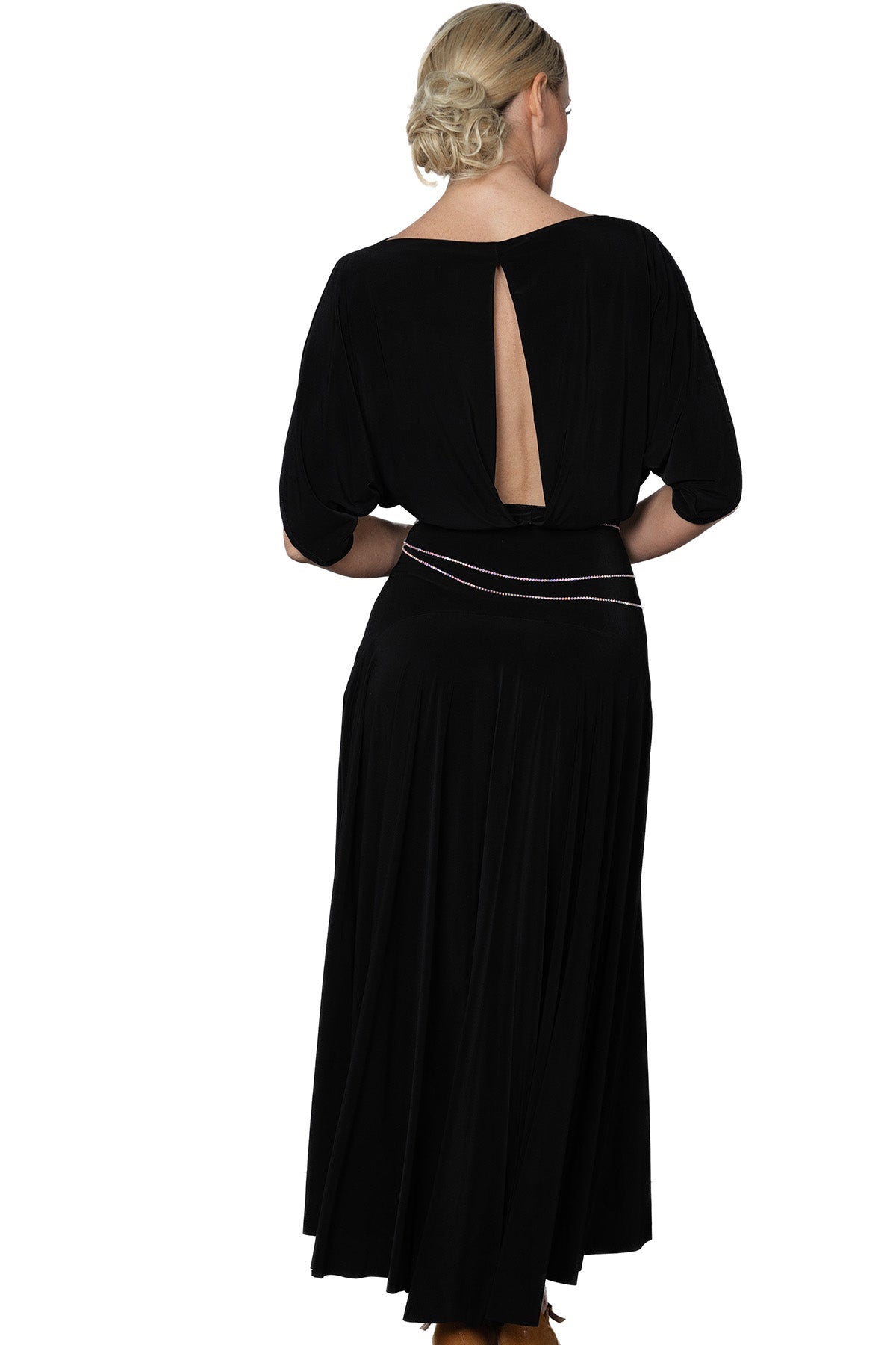 Expertly crafted for the ballroom, the D2402 Simple Long Dress offers a loose top design and a stylish slit in the back for maximum comfort and mobility. Perfect for dancers looking for a simple yet elegant look. Pictured in Black