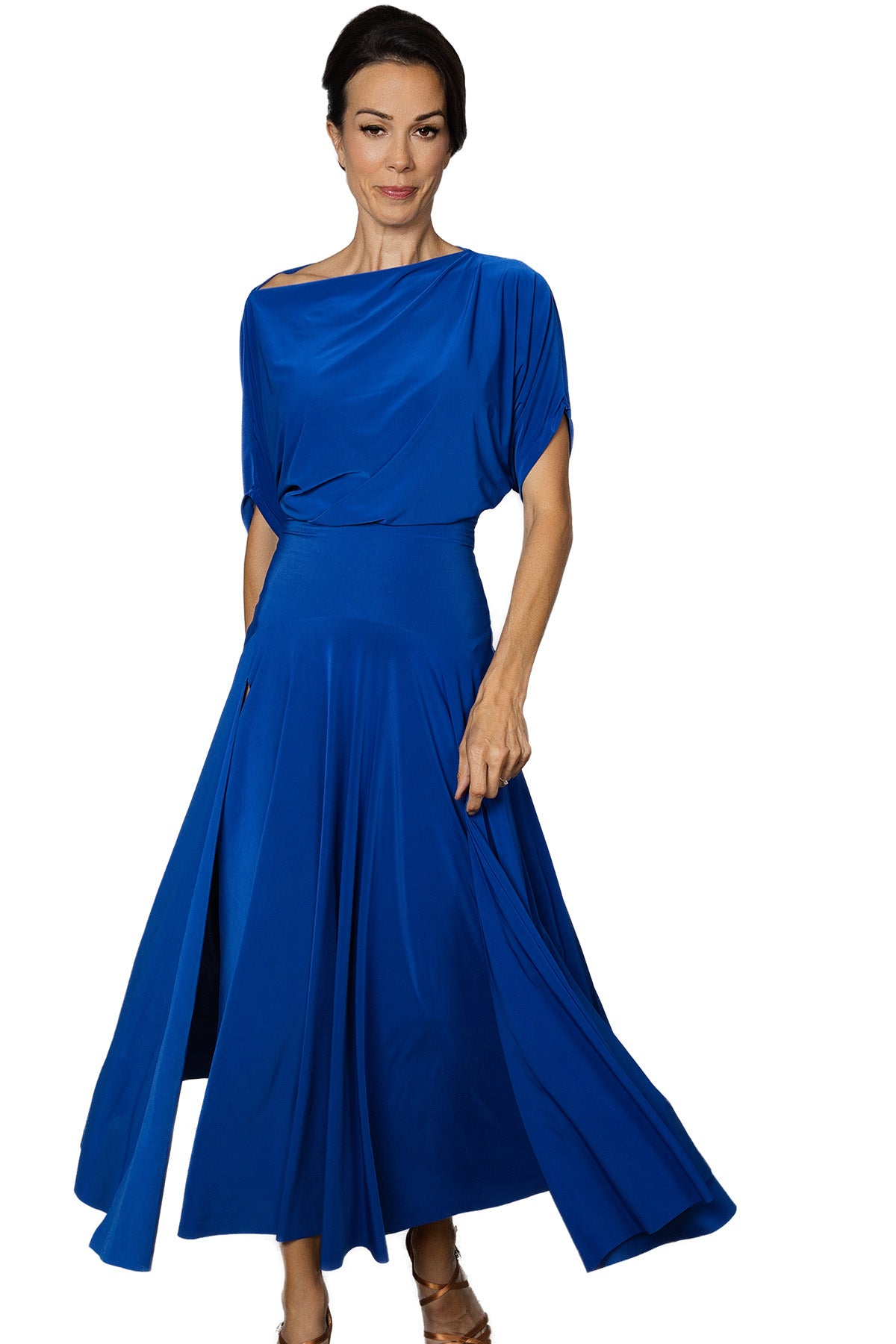 Expertly crafted for the ballroom, the D2402 Simple Long Dress offers a loose top design and a stylish slit in the back for maximum comfort and mobility. Perfect for dancers looking for a simple yet elegant look. Pictured in Blue