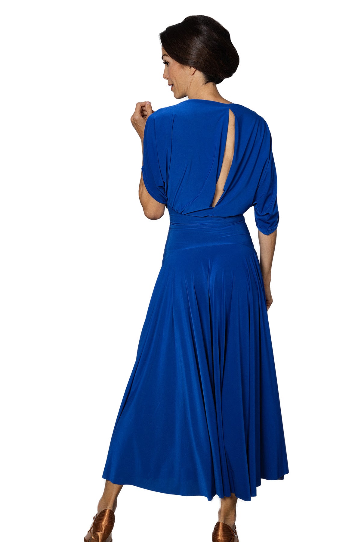 Expertly crafted for the ballroom, the D2402 Simple Long Dress offers a loose top design and a stylish slit in the back for maximum comfort and mobility. Perfect for dancers looking for a simple yet elegant look. Pictured in blue