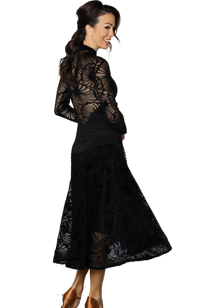 Indulge in luxury with our D2411 Long Velvet Burnout Gown. A full circle velvet burnout skirt with a subtle shine and crinoline provides a stunning silhouette. The back features burnout velvet for a hidden, yet sexy, touch. Experience the ultimate elegance with this dress. black