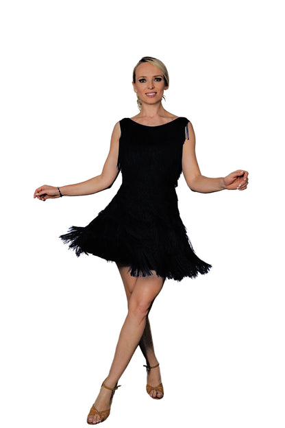 D2422 Full Fringe Dress  Indulge in luxury with our D2422 Full Fringe Dress. The top and full skirt is adorned with our exclusive 6 inch stretchable Fringe, creating a mesmerizing visual and a dress that moves effortlessly. Elevate your style with this unique and elegant piece. black