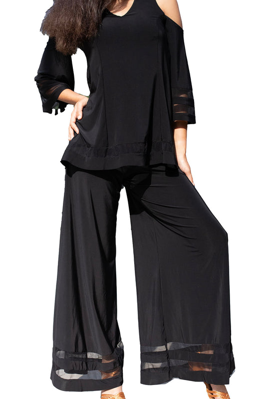 Elevate your style with our P207 Mesh Banded Palazzo Pants! These high-waisted palazzo pants not only add a fun twist to your wardrobe, but also provide a flattering fit that will have you feeling confident and comfortable. black