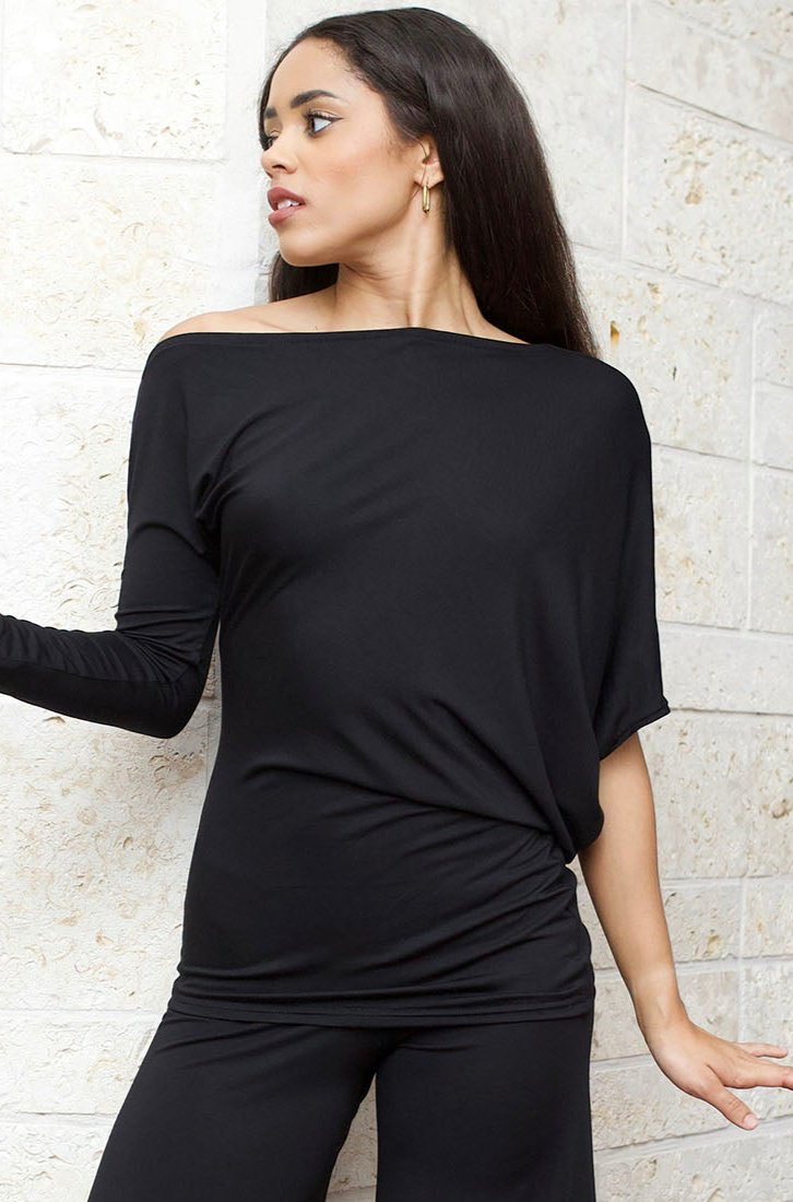 Experience the perfect blend of style and comfort with our NT9 Sack Top. Made from natural fabric, this top features one tight sleeve and one loose sleeve for a unique look. The semi-fitted design adds a touch of elegance to your outfit. black