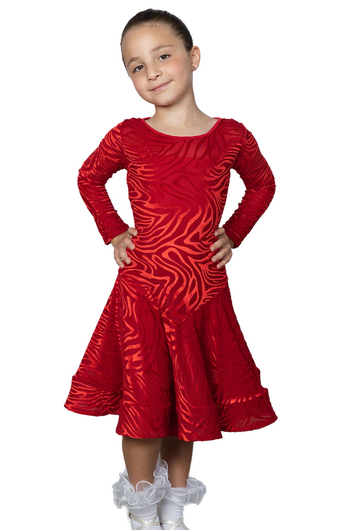 Put your little dance star in the spotlight with this JR - D1V Girls Velvet Latin Dress. Your daughter will feel like a dancing queen as she salsas and twirls in this elegant and comfy dress. The soft velvet fabric and vibrant color will make her stand out on the dance floor. pictured in red