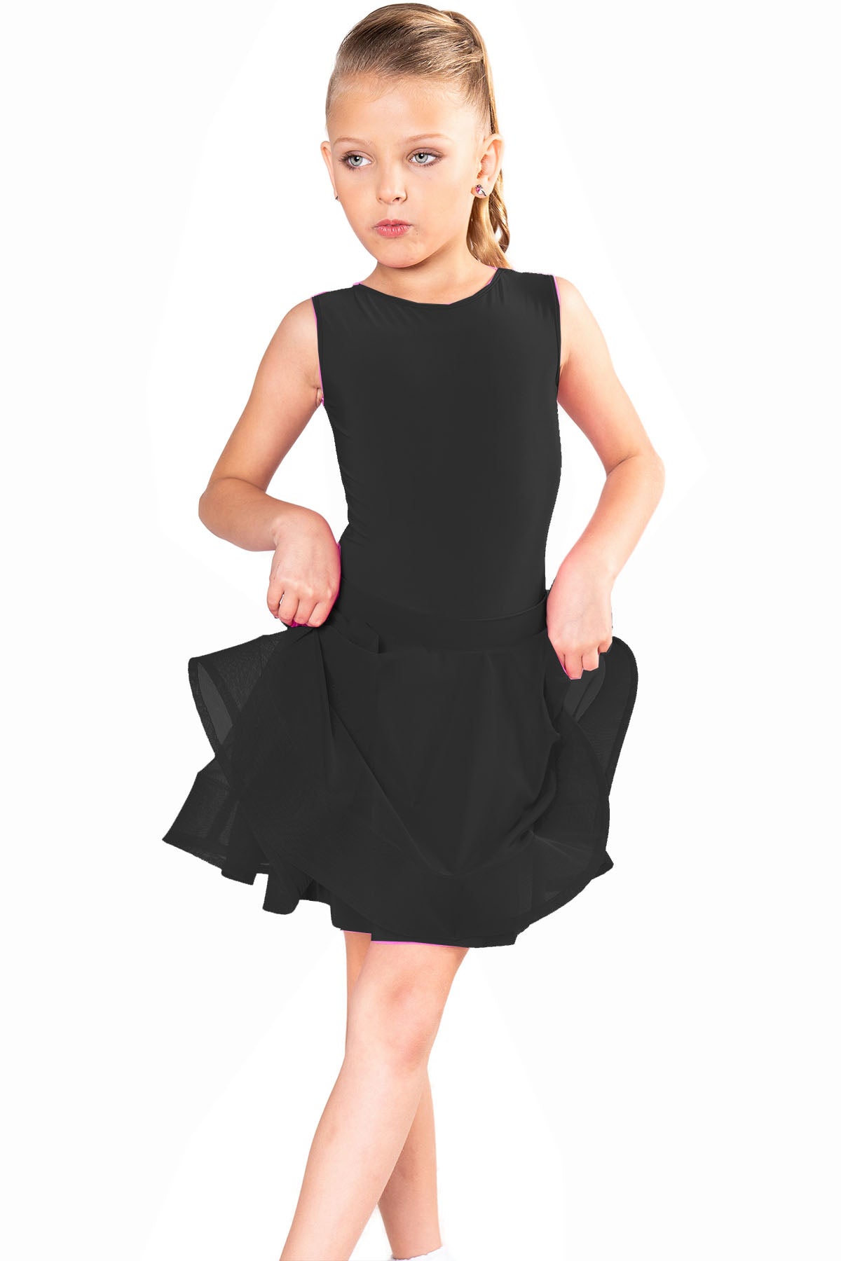 The JR - S1 Girls Mesh Latin Skirt is a regulation skirt designed for young dancers. Its adjustable back bow adds a touch of elegance and versatility. Pair it seamlessly with interchangeable girl's leotards. With 95% Poly and 5% Spandex, it is travel-friendly and wrinkle-resistant for all-day wear. Designed by dancers for dancers, it's perfect for both practice and competition. Production time is only 7-10 business days if an item is not in stock. black