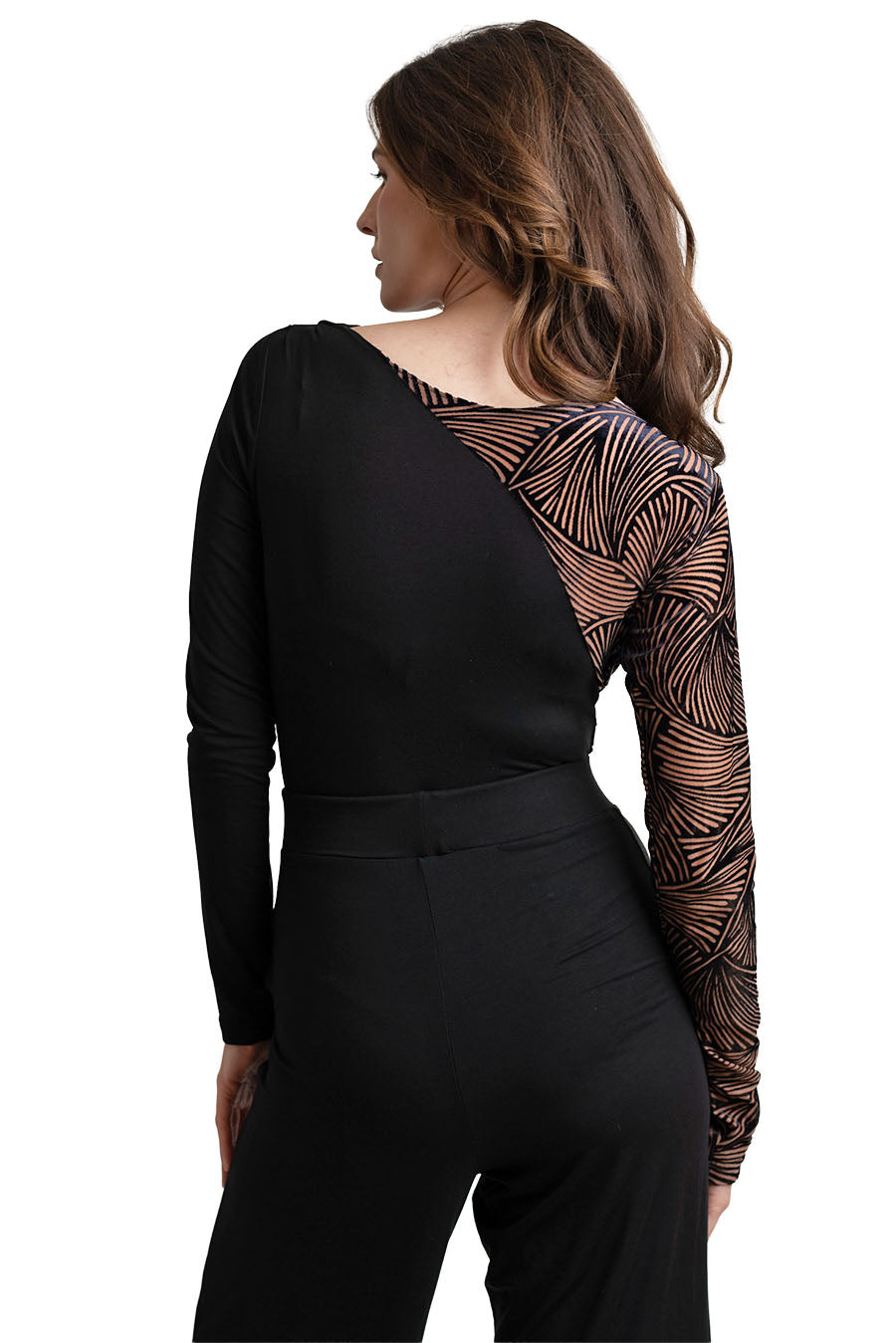 Woman wearing a black outfit with a patterned back on a white background