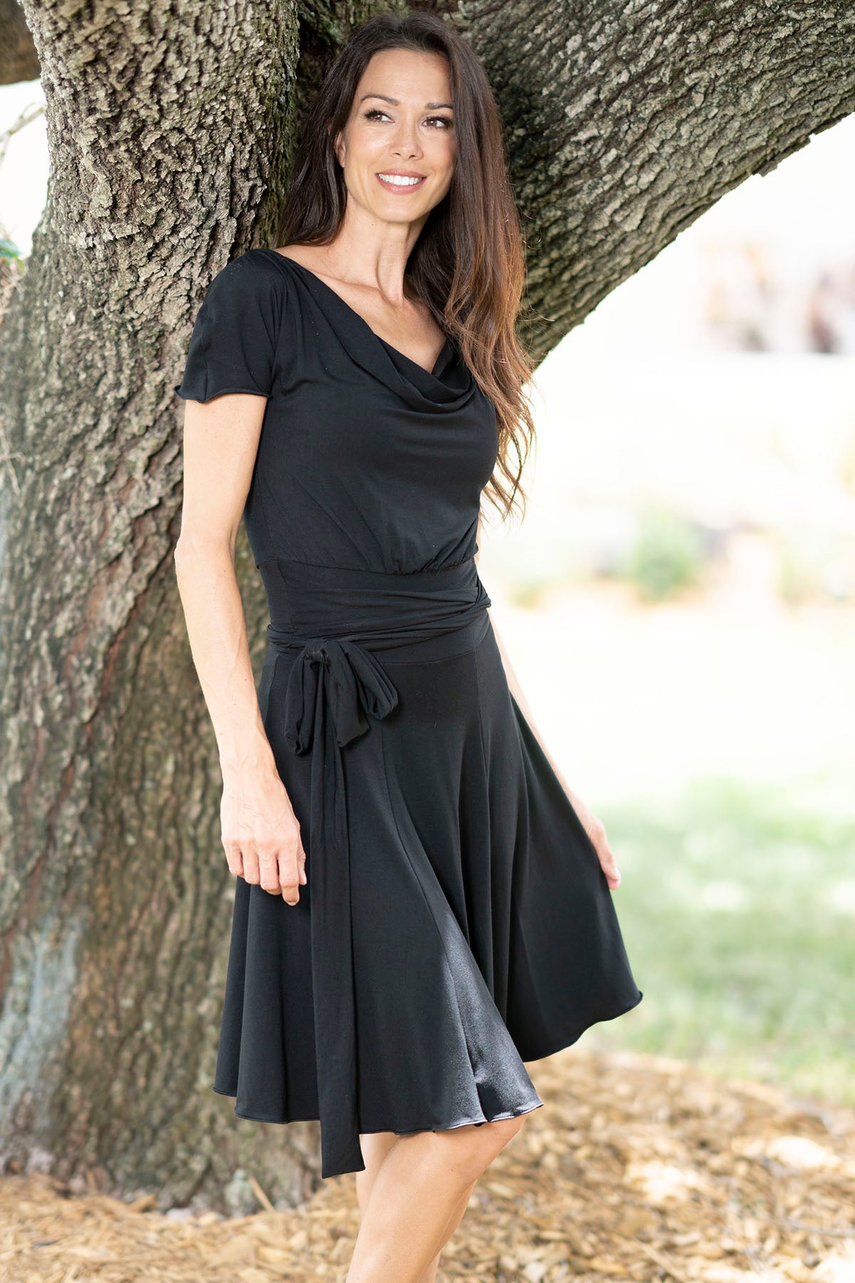 Effortlessly chic, our ND1 Simple Sun Dress combines style and comfort with its natural fabric and trendy belt. Perfect for any occasion, the built-in shorts provide convenience while maintaining a clean and modern look. Embrace the beauty of simplicity with this versatile dress. black