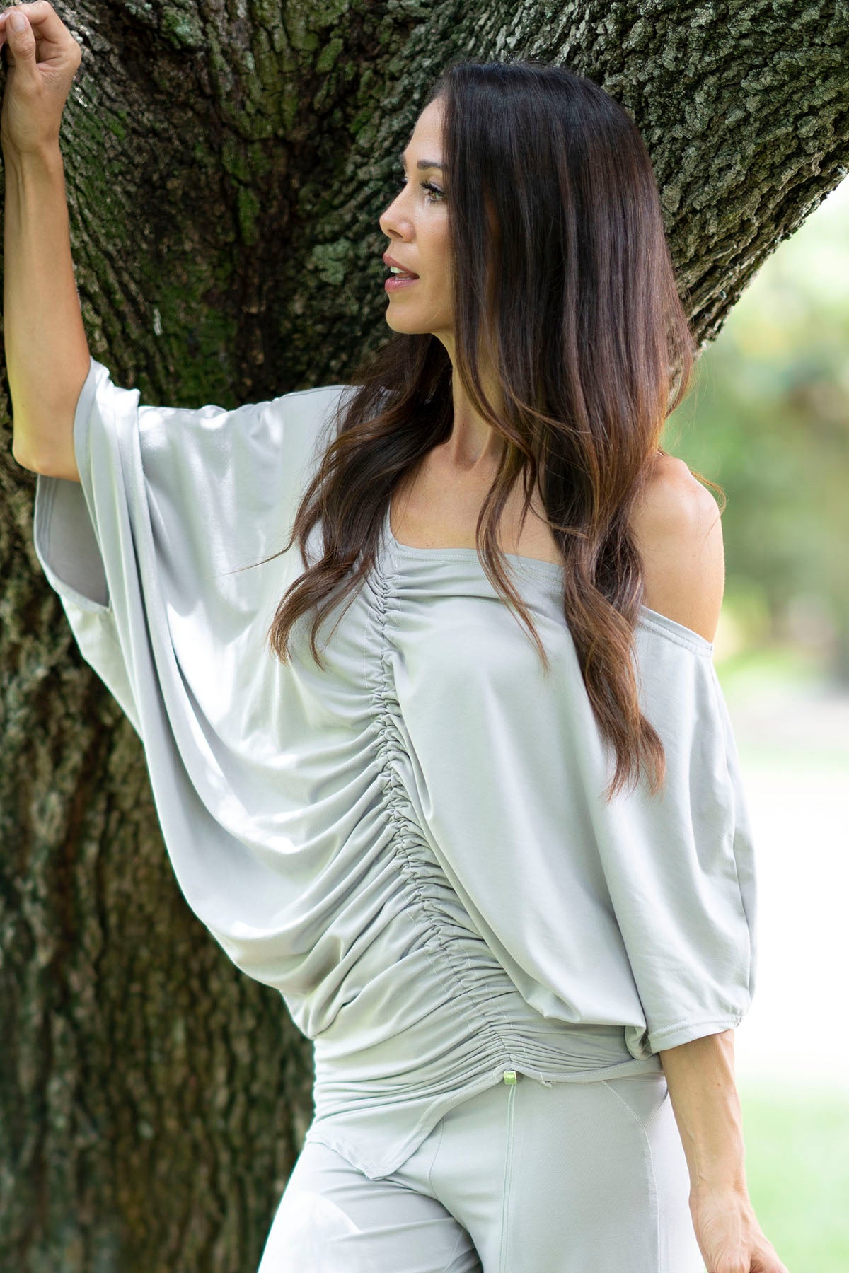 Made with natural fabric, this versatile piece offers a loose fit for maximum comfort. With its drawstring design, you can easily adjust the fit to your liking. Wear it as a top or a dress, the choice is yours! heather