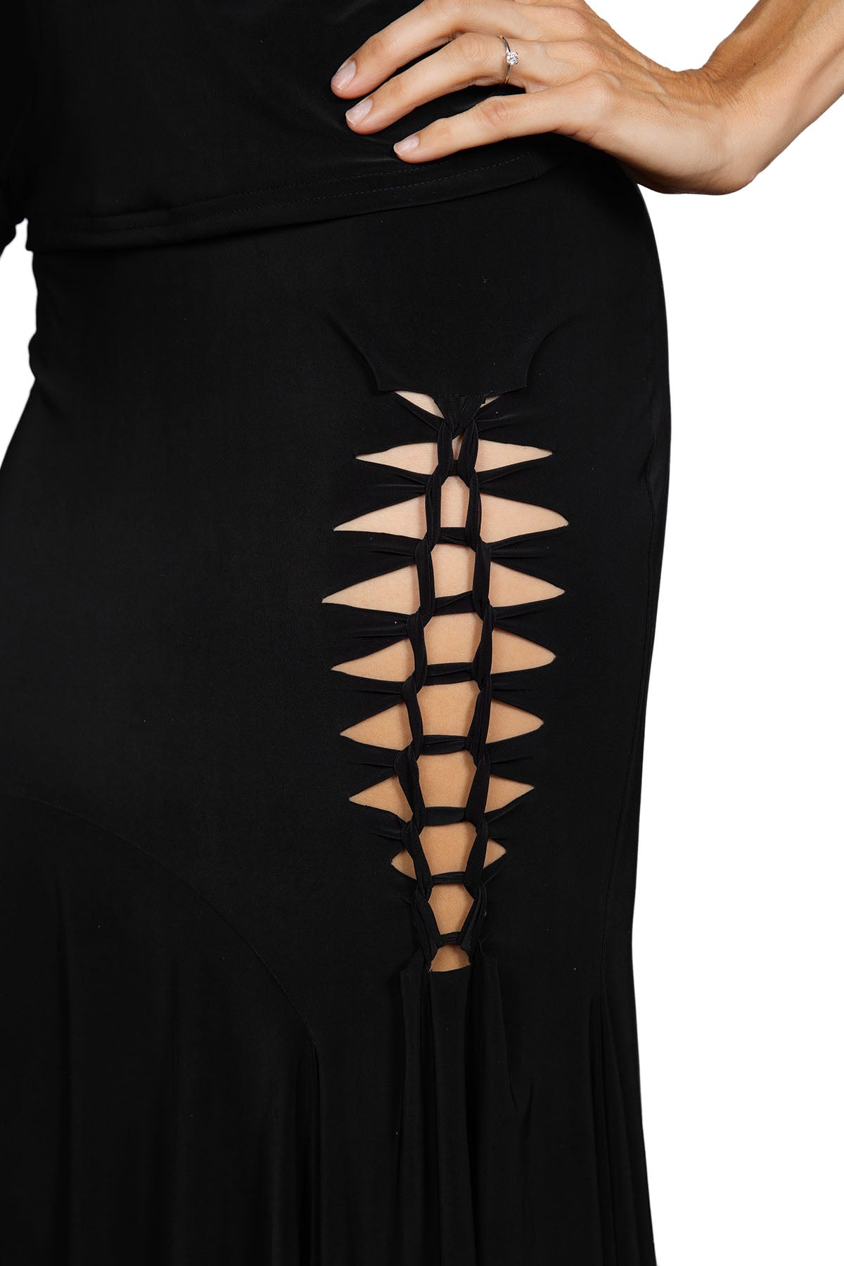 S2409 Crochet Skirt  Stand out on the dance floor with the S2409 Crochet Skirt. This daring skirt showcases sexy cutouts in a unique crochet pattern. Perfect for those who like to take risks and make a statement. Step out in style and confidence with this must-have piece!  Crochet Detail in Black Skirt