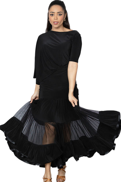 S2412 Long 3 Tiered Ruffle Skirt  Get ready to dance the night away in our S2412 Long 3 Tiered Ruffle Skirt. Perfect for ballroom dancing, this skirt moves with you and adds a touch of glamour to your dance moves. You'll be sure to steal the show in this smooth and elegant skirt. Black