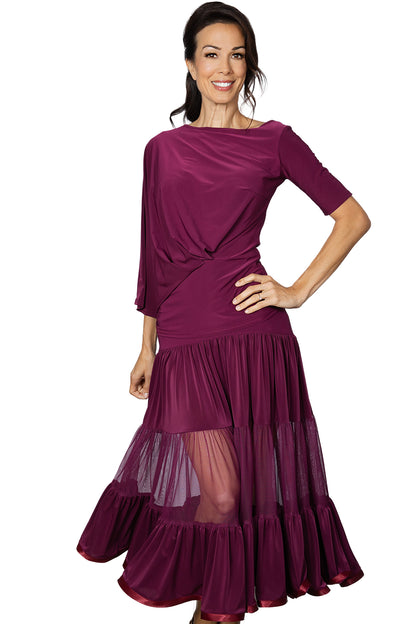 S2412 Long 3 Tiered Ruffle Skirt  Get ready to dance the night away in our S2412 Long 3 Tiered Ruffle Skirt. Perfect for ballroom dancing, this skirt moves with you and adds a touch of glamour to your dance moves. You'll be sure to steal the show in this smooth and elegant skirt. Wine