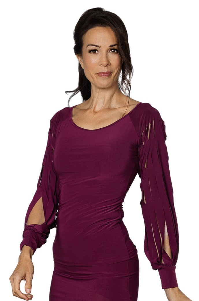 Unleash your edgy side with our T2415 Top featuring band cut sleeves. Perfect for adding a playful touch to any outfit, this top will have you standing out from the crowd. Embrace your unique style with this one-of-a-kind piece. wine