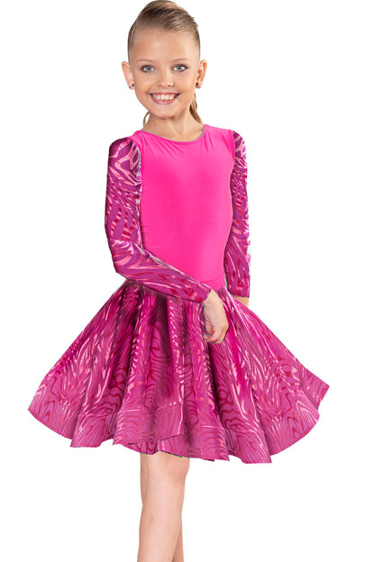 The JR - S1 Girls Burnout Velvet Latin Skirt is a regulation skirt designed for young dancers. Its adjustable back bow adds a touch of elegance and versatility. Pair it seamlessly with interchangeable girl's leotards. With 95% Poly and 5% Spandex, it is travel-friendly and wrinkle-resistant for all-day wear. Designed by dancers for dancers, it's perfect for both practice and competition. Production time is only 7-10 business days if an item is not in stock. pictured in pink