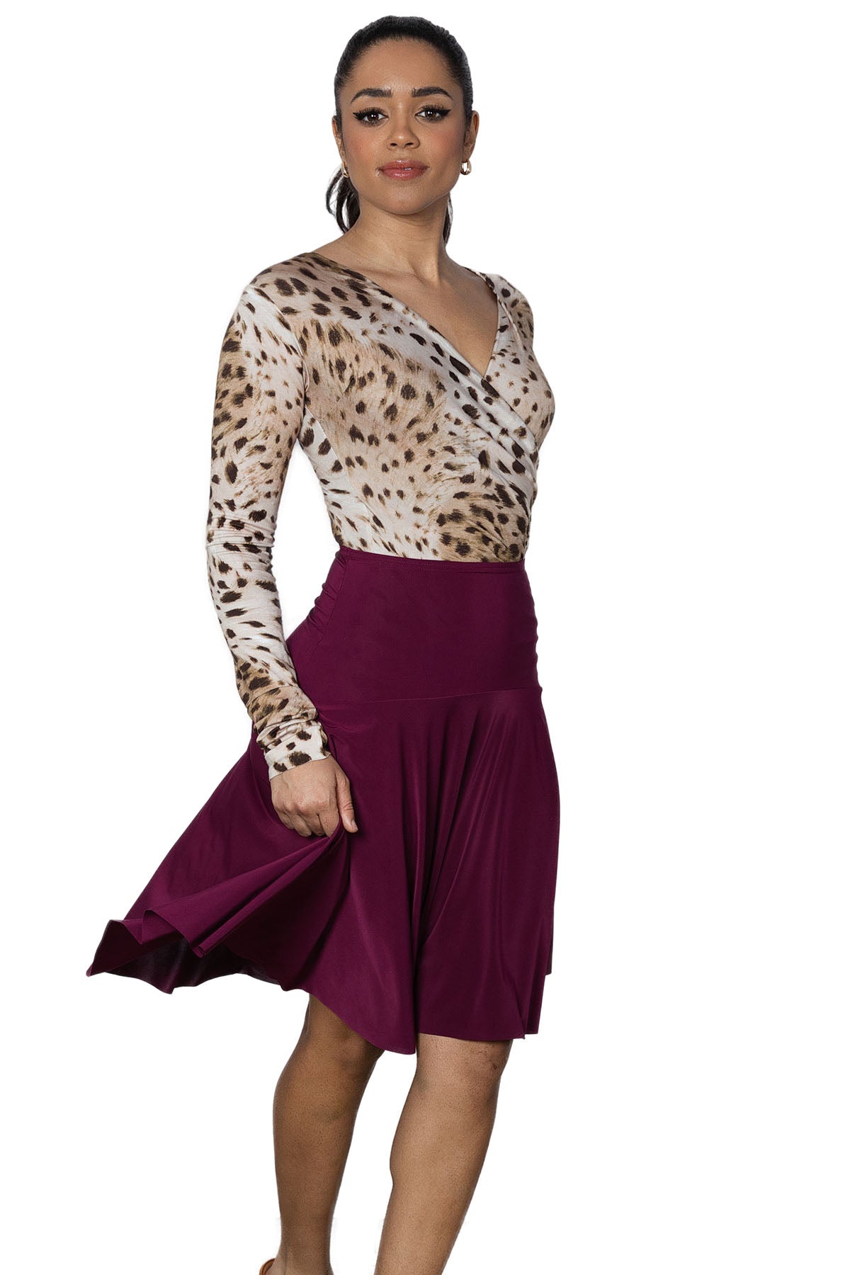 S2403 Simple Short Skirt  The S2403 Simple Short Skirt is the perfect addition to any ballroom dancer's wardrobe. Its simple design allows for great movement on the dance floor. No frills, just fun!wine