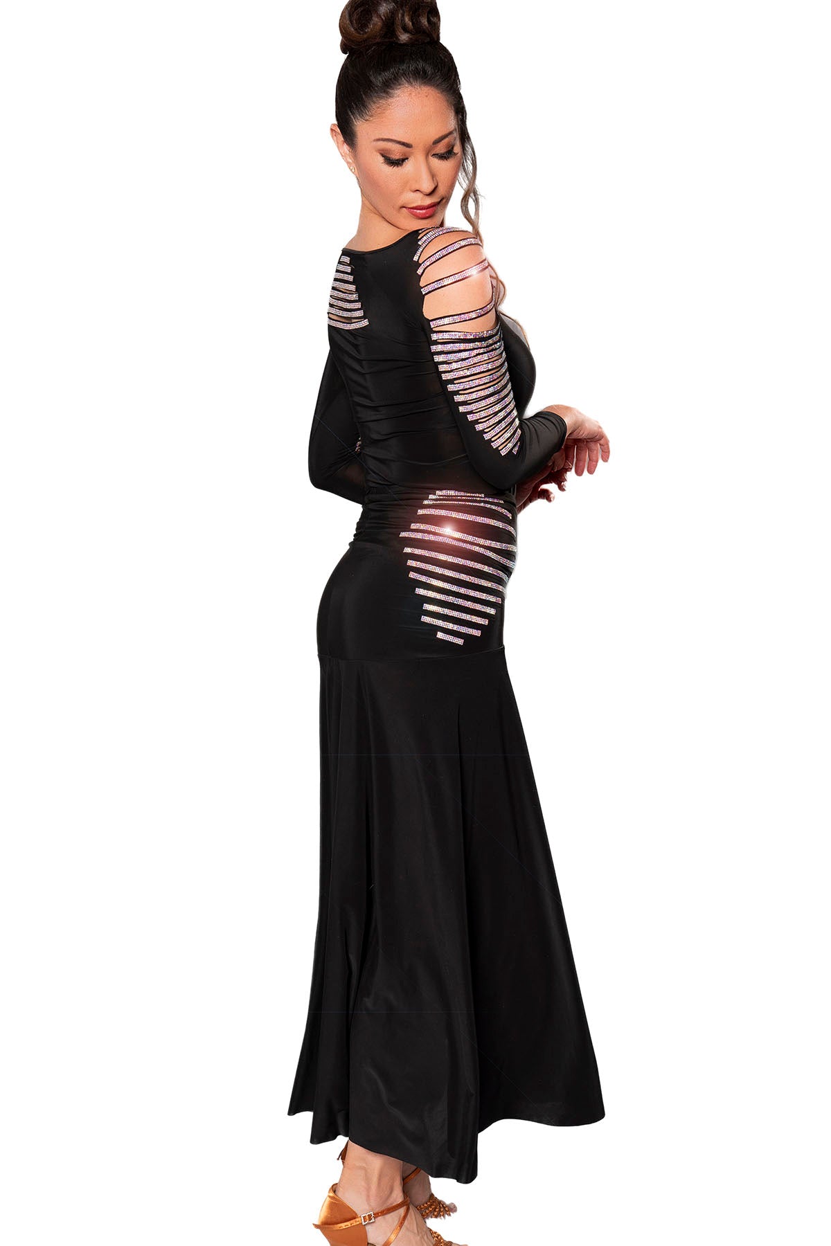 Indulge in the seductive elegance of the S219 Long Horizontal Stone Striped Skirt. This exquisite piece features delicate rhinestones that sparkle and shine right on the hips. With its long and flowy design, this skirt is perfect for making a dramatic entrance and leaving a lasting impression. black