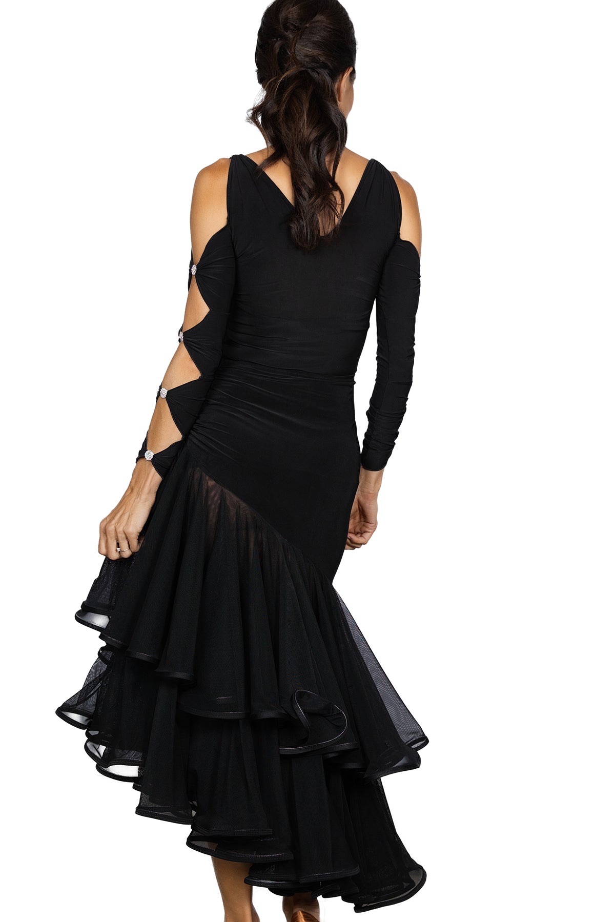 S2414 Long Flamenco Skirt  Get ready to ruffle some feathers (in the best way possible) with our S2414 Long Flamenco Skirt. Perfect for a night out or a day at the beach, this skirt will have you dancing all day long. So go ahead, twirl away in this flamenco-inspired masterpiece. Black