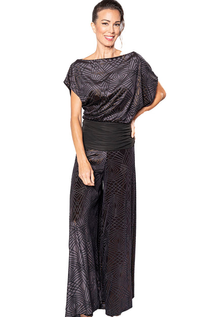 Indulge in sheer comfort and elegance with our P2405 extra wide palazzo dance pant for women. The breezy, flowy style allows for effortless movement while the extra wide leg adds a touch of sophistication. Perfect for dancing or lounging, this pant is a must-have for any stylish and discerning woman.