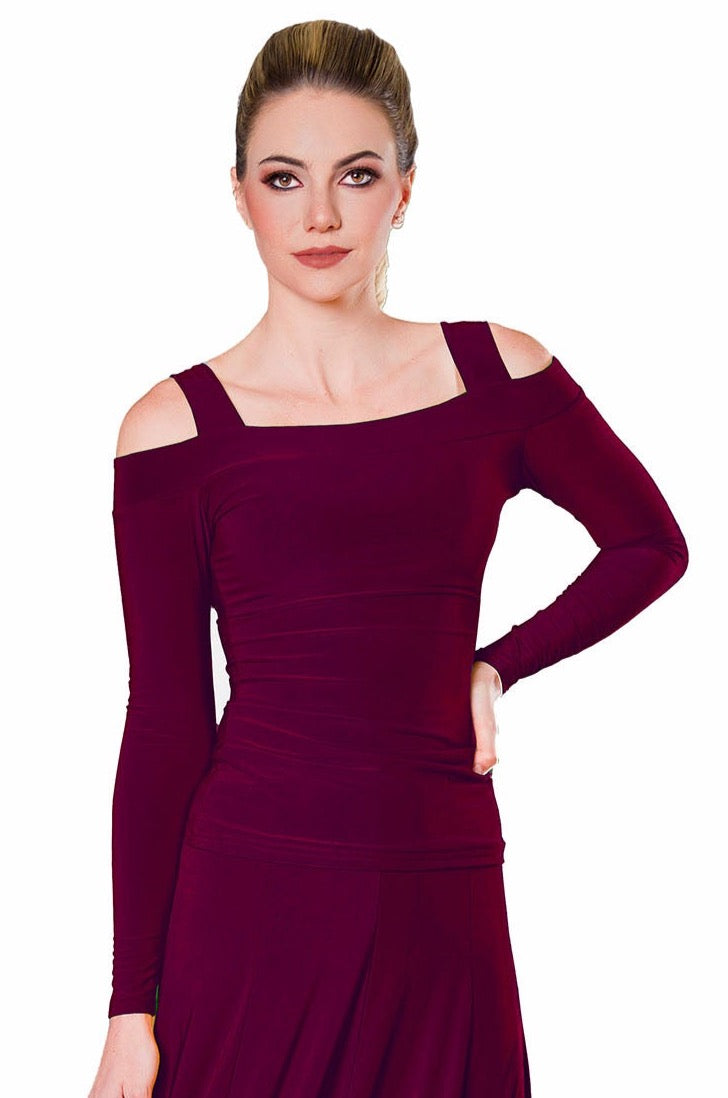 Introducing the T2403 Cold Shoulder Box Top. Made with our signature fabric, this top is designed with cold shoulder cutouts for a trendy yet effortless look. Perfect for any occasion, this top provides both style and comfort. Upgrade your wardrobe with this must-have piece.wine