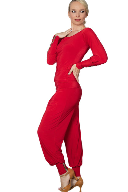 P2402 Circle Embellished Harem Pants  Effortlessly elevate your ballroom wardrobe with our P2402 Circle Embellished Harem Pants. The wider cut and ankle cuff, adorned with a golden grommet trim, create a playful and stylish look. Perfect for those who want to make a statement on the dance floor. red