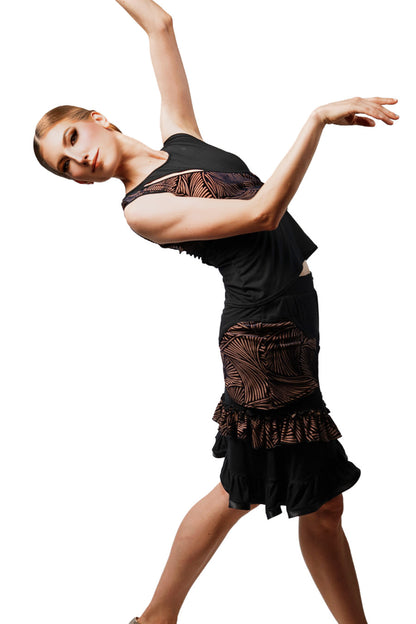 Short Skirt with waved ruffles features our signature black and tan fabric with an uneven hemline and satin banding