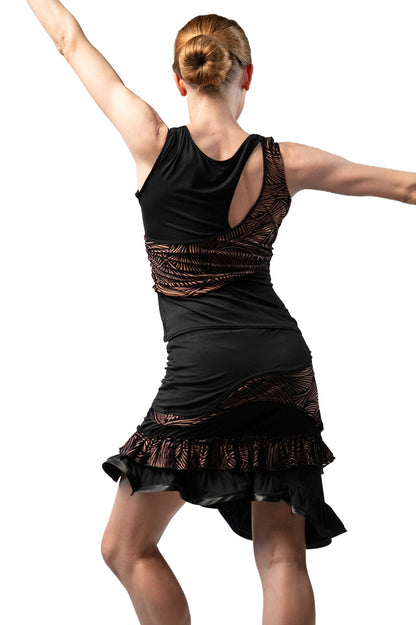 Short Skirt with waved ruffles features our signature black and tan fabric with an uneven hemline and satin banding