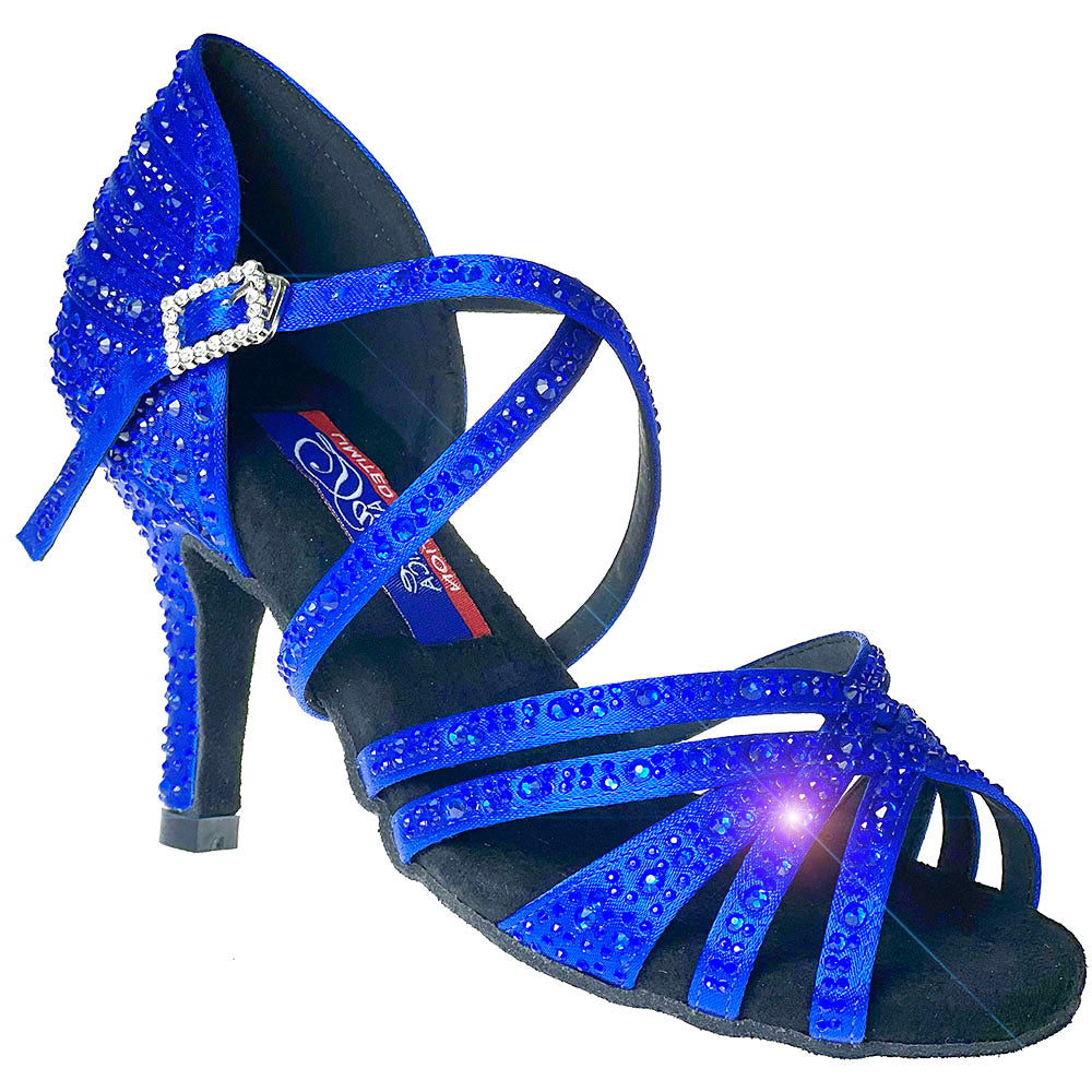 Step into luxury with Vegas Blue Satin decorated with blue Rhinestones. Designed with 6mm memory foam for ultimate comfort and unbeatable flexibility, these shoes keep your small toe in place with a wider strap. Experience the perfect fit and a 2.75 " slim heel that elongates your legs. Elevate your dance game with Vegas.Limited Edition